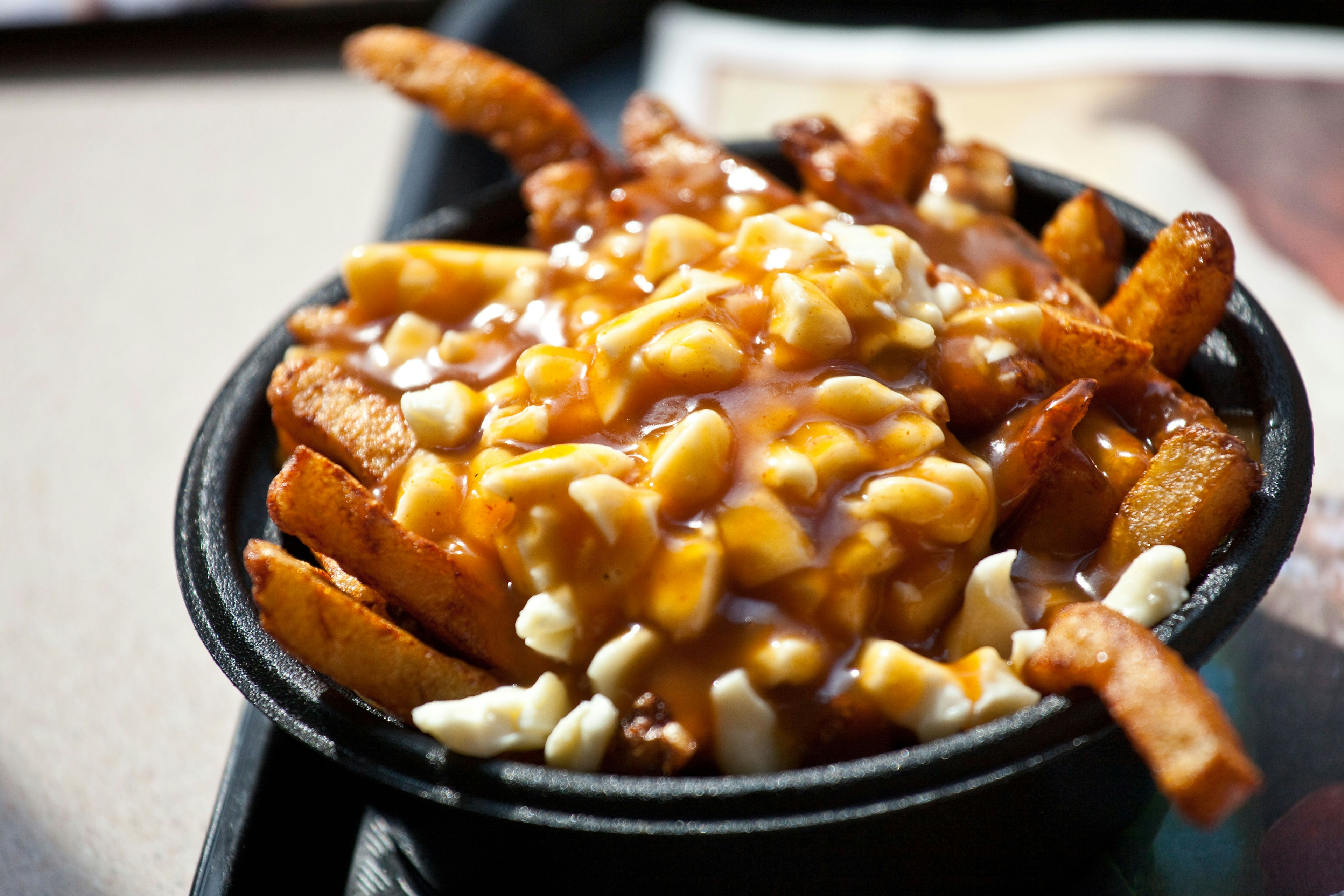 Closeup of poutine at La Belle Province restaurant in Montreal, Canada