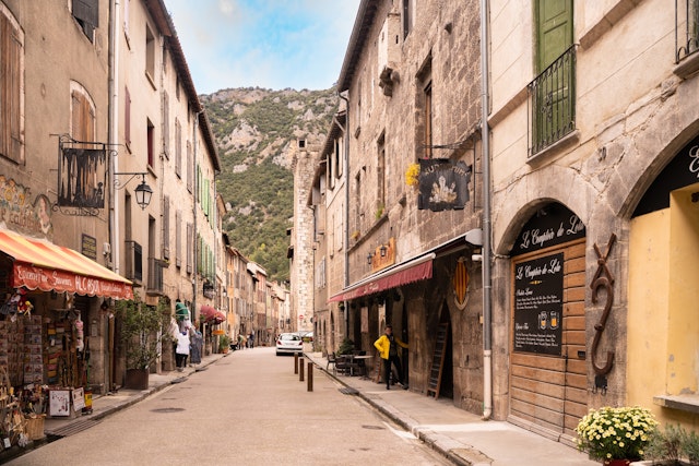 A small village road with stone buildings
