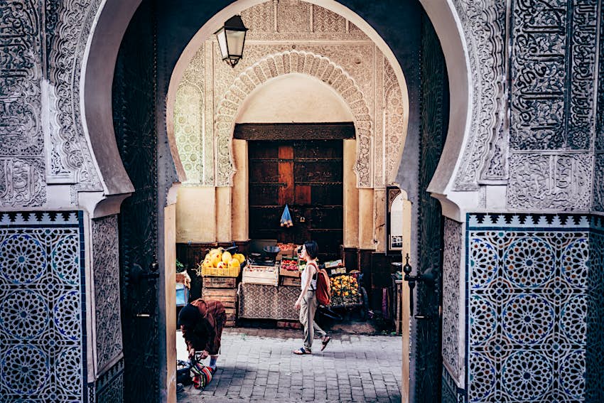 Asian woman tourist getting around in Marrakesh