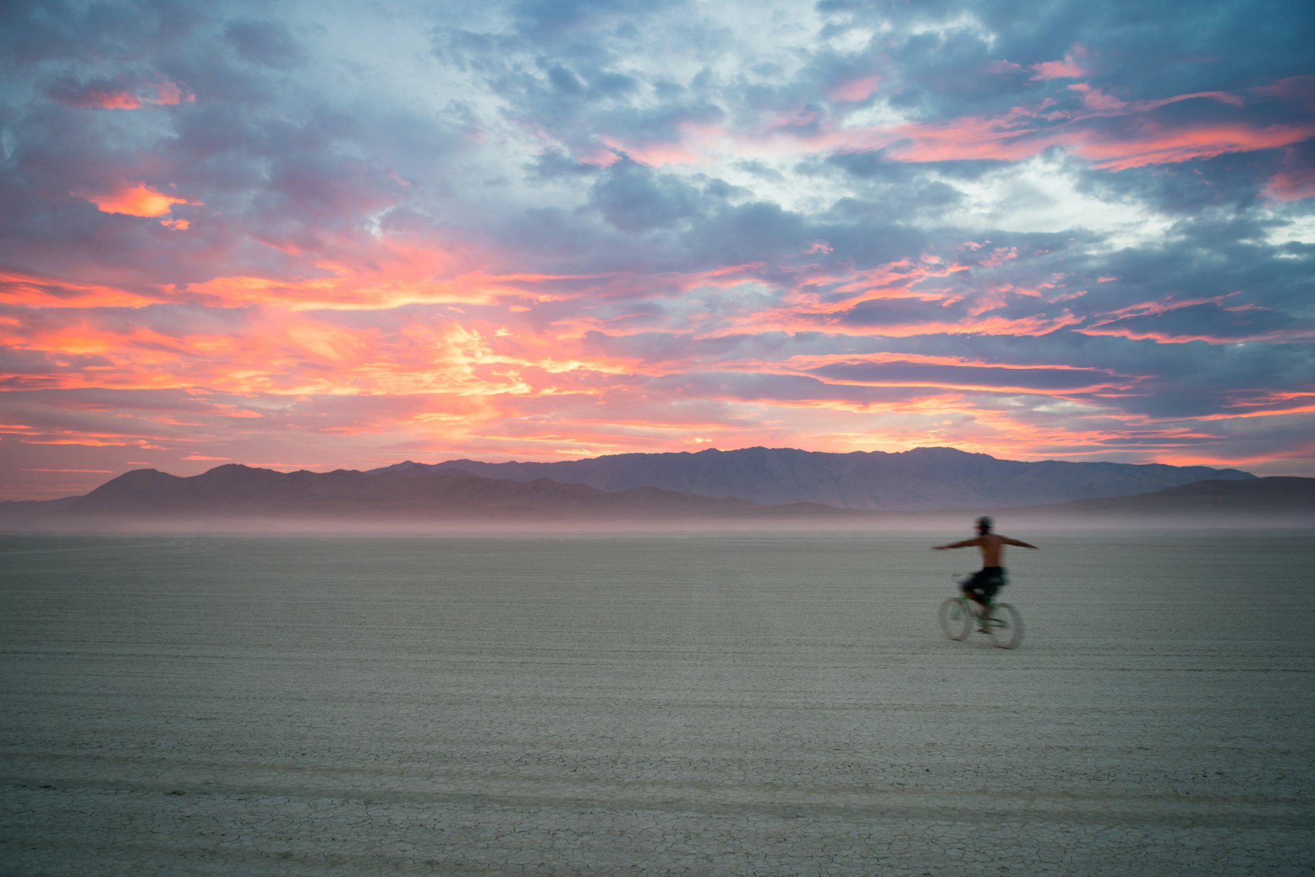 Riding into the desert sunset at Burning Man