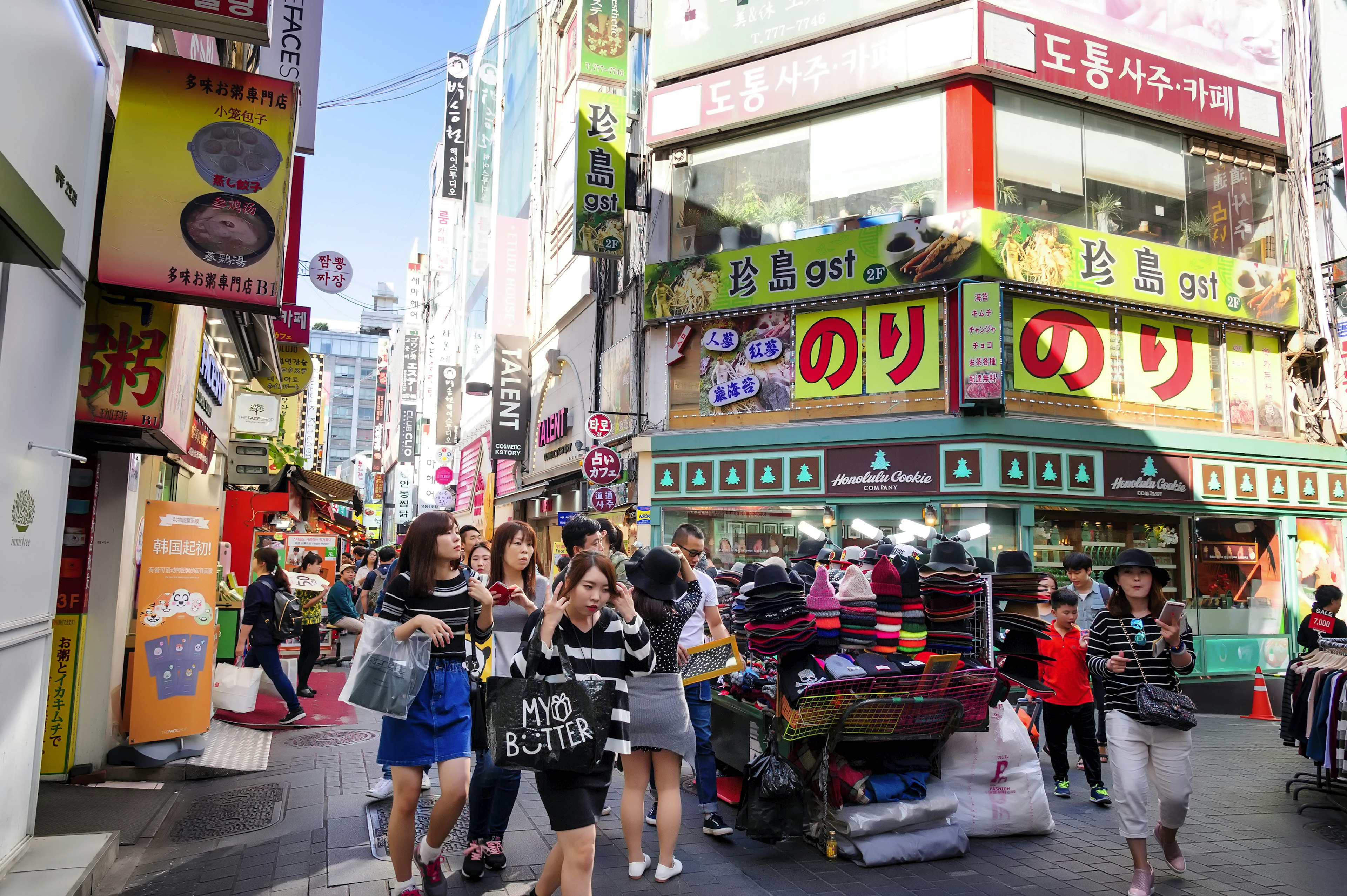 Seoul, Korea - October 3, 2015 : Myeong-Dong shopping street, Korean people tourists walking shopping the neighbourhood. It is fashionable to be the most popular. neighbourhood is must when traveling.