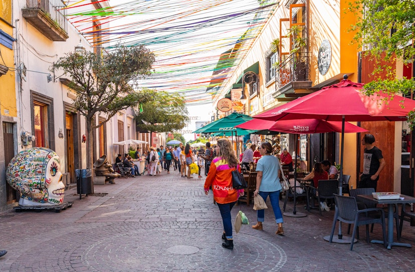 San Pedro Tlaquepaque, Jalisco, Mexico - November 23, 2019: Locals and Tourists exploring the restaurants and shops on Independencia Street