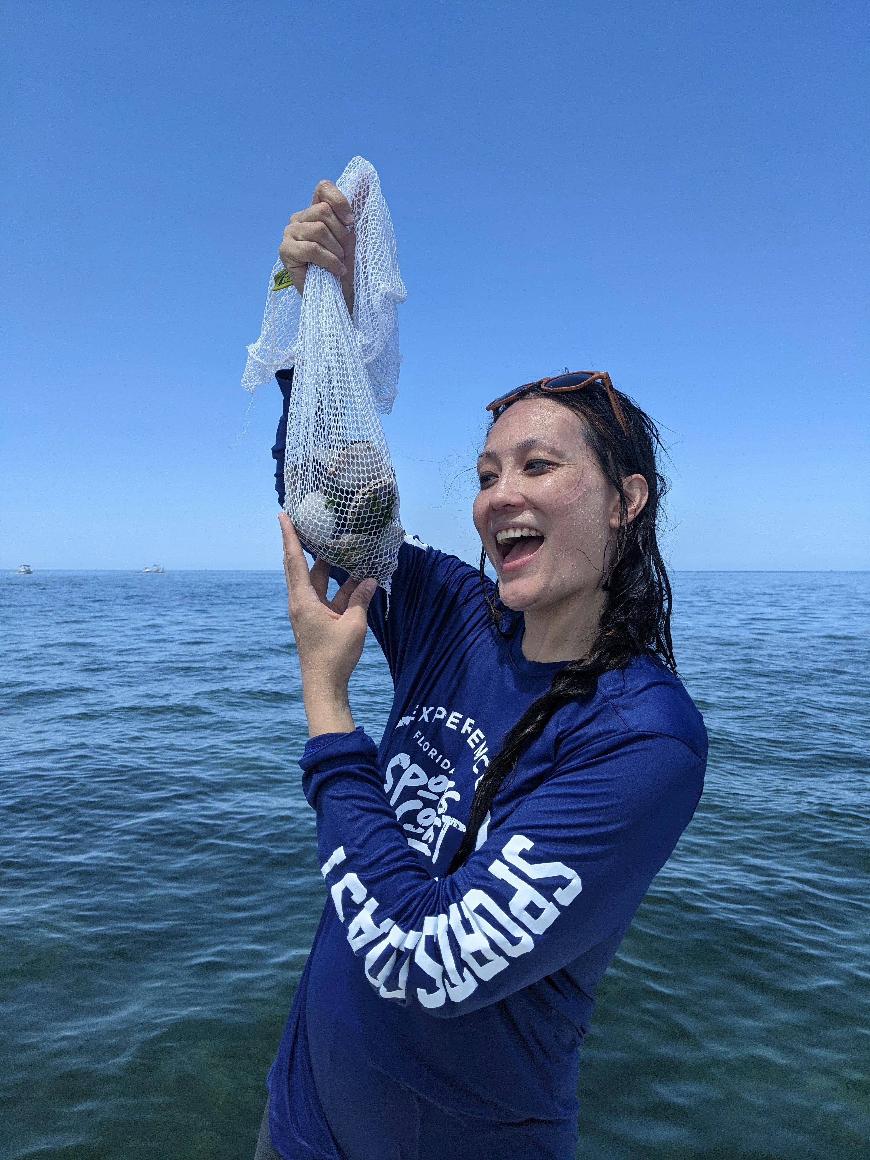 The bounty of Katherine's successful dive for scallops