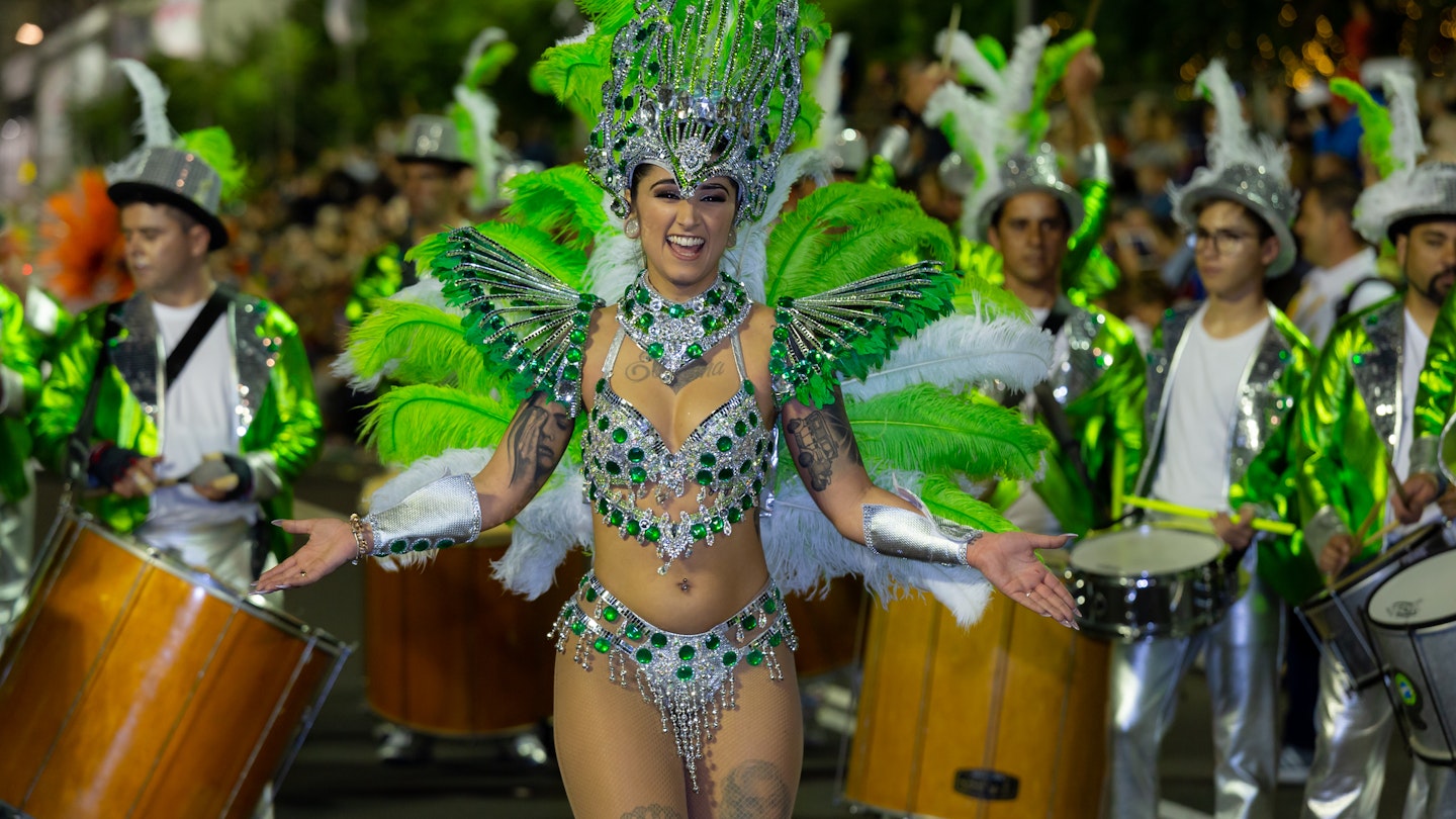 FUNCHAL, PORTUGAL - FEBRUARY 2020: Participants of Madeira island Carnival dancing in the parade in Funchal city, Madeira island, Portugal.