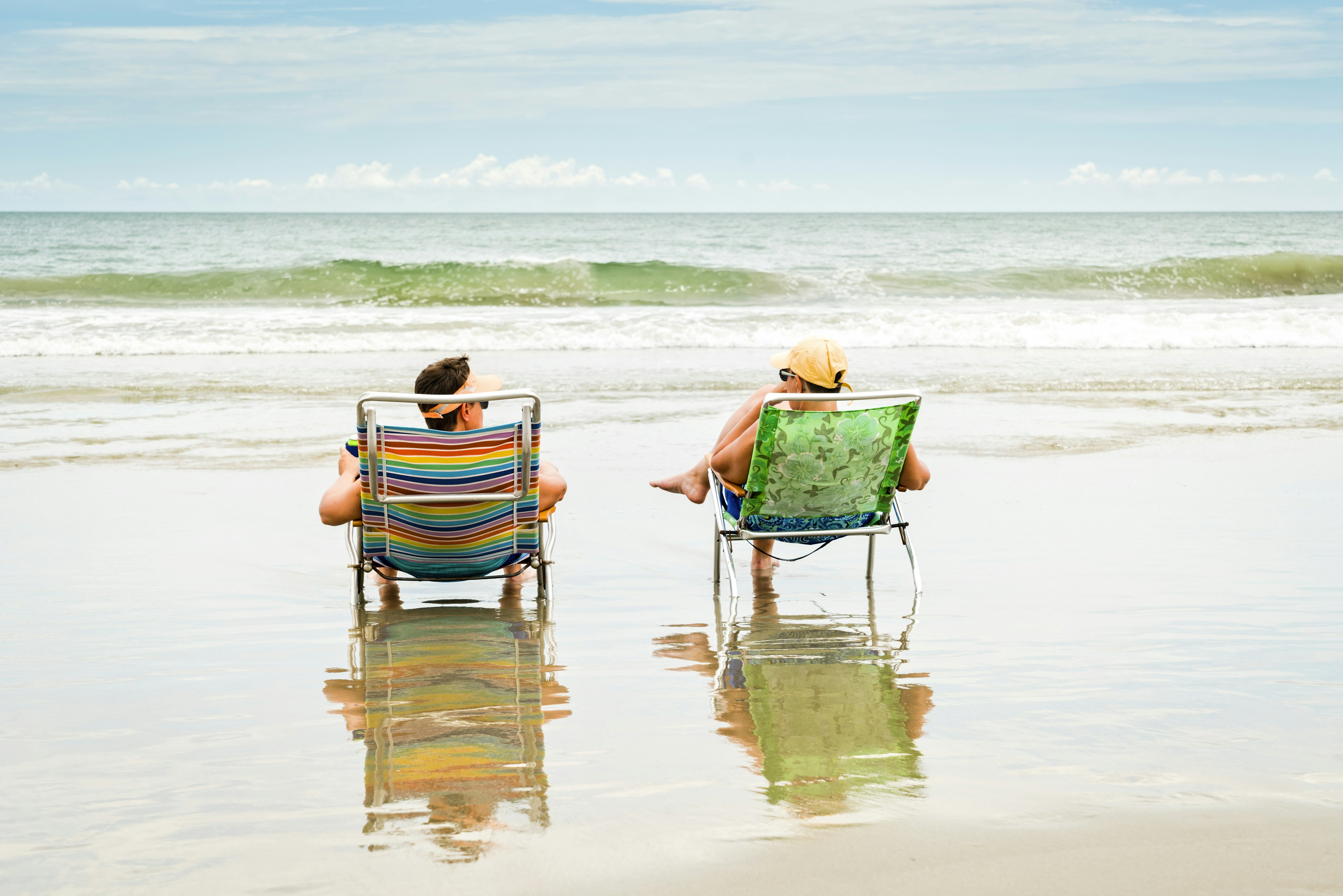 A couple sitting in deck chairs on Myrtle Beach in South Carolina