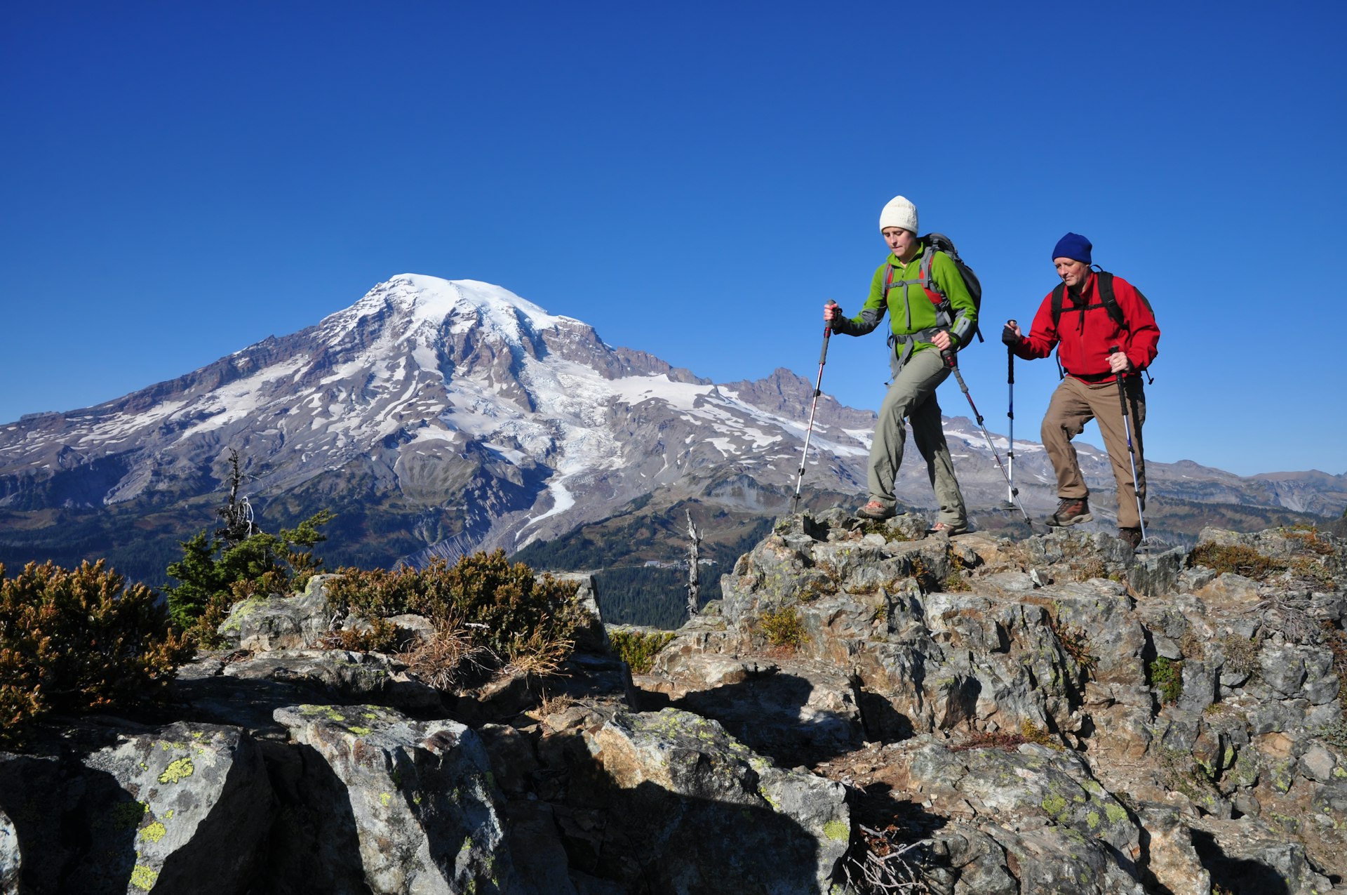 Two people hiking in a mountainous area