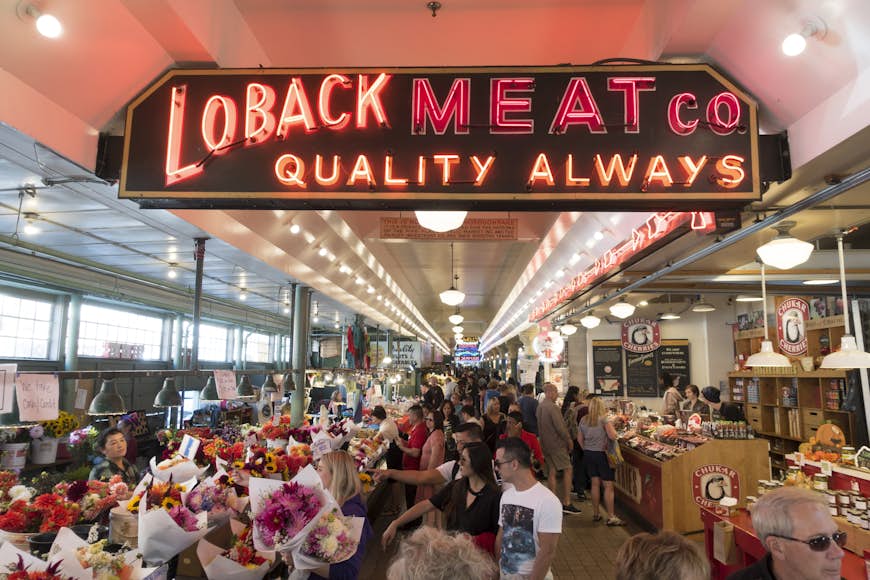 Tourists and shoppers inside the famous Pike Place Market in downtown Seattle