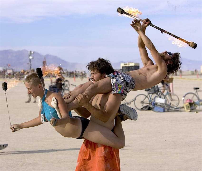 A firey performance at The Burning Man Festival in the Black Rock Desert of Nevada