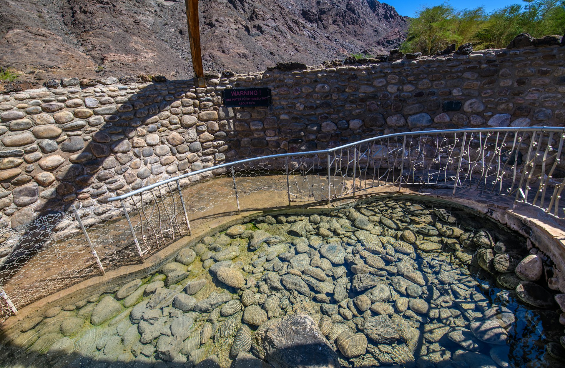 A paved path leads to a hot spring in |Ai-|Ais/Richtersveld Transfrontier Park, Namibia, Africa