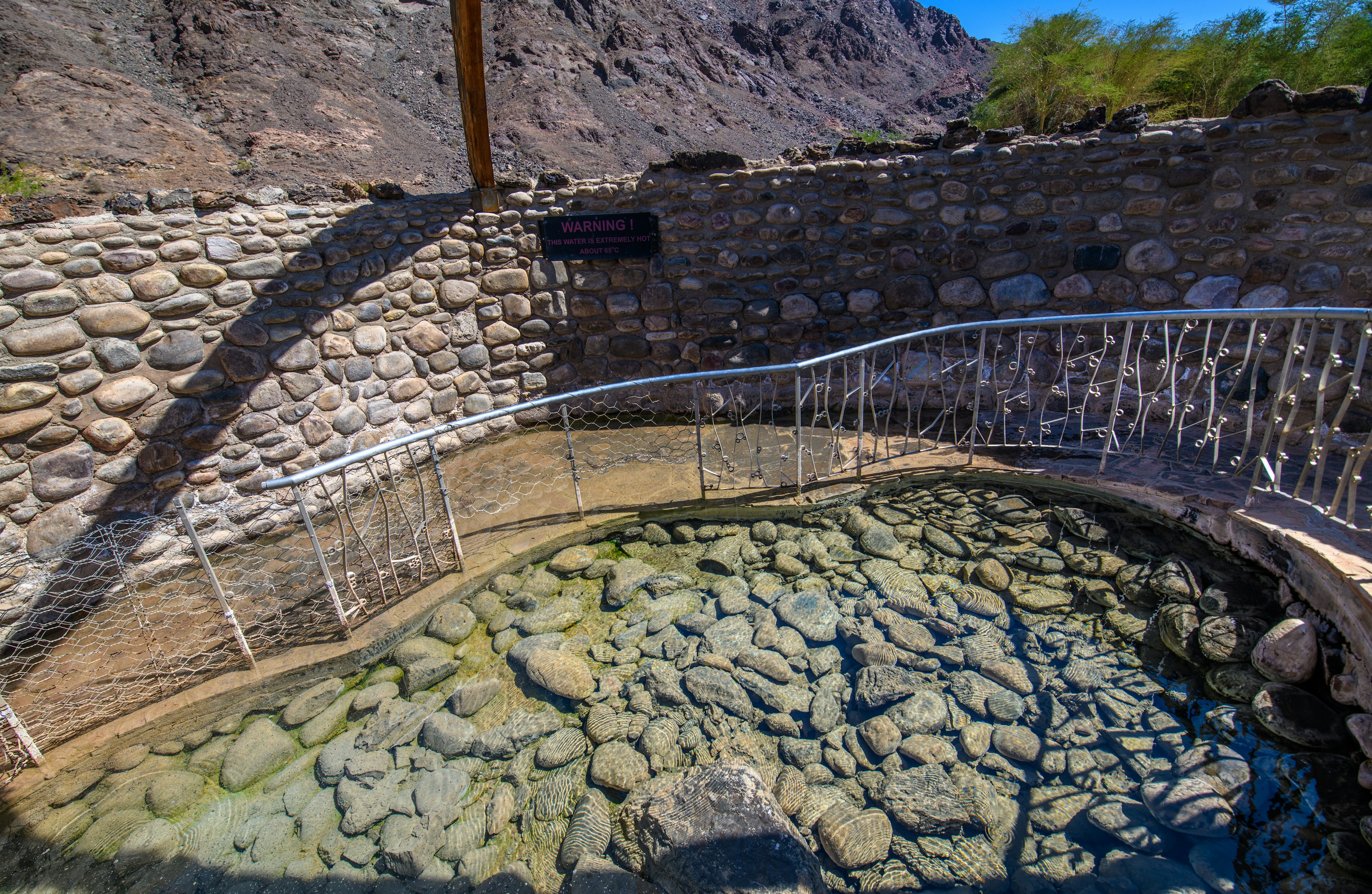 A paved path leads to a hot spring in |Ai-|Ais/Richtersveld Transfrontier Park, Namibia, Africa