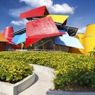 Panama City, Panama - February 1, 2019: Landscaped Flower Garden and Biomuseo Building Exterior, a museum of Natural History of Central America, located on Amador Causeway
