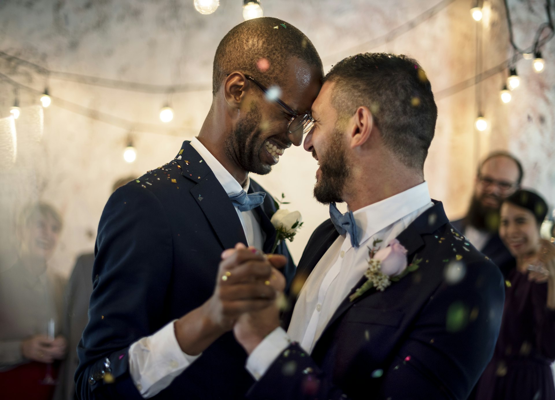 A newlywed gay couple celebrates their nuptials, now a possibility in Switzerland