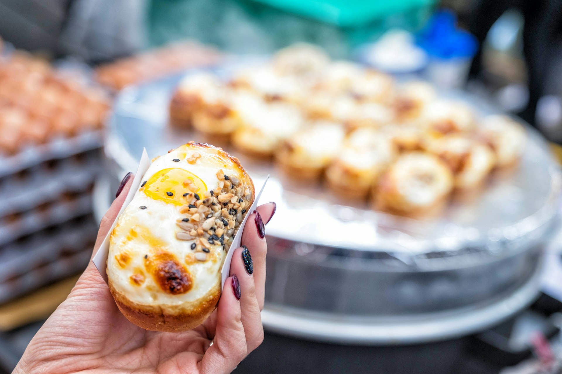 Egg bread with almond, peanut and sunflower seed at Myeong-dong Street, Seoul, South Korea