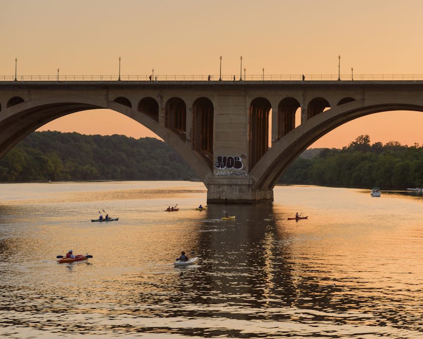 Kayakers on the Potomac River at sunset in Georgetown, Washington, DC