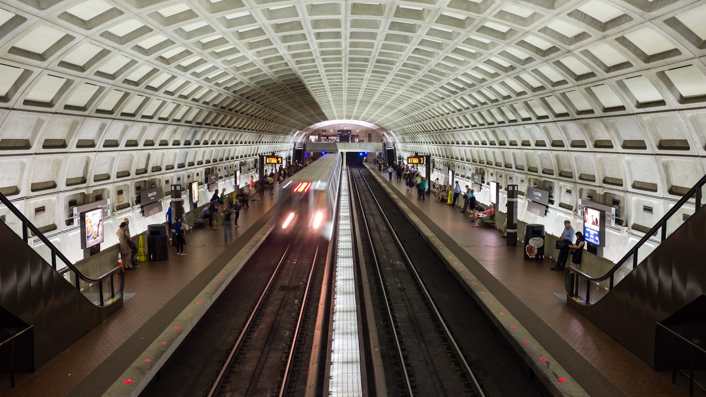 A subway train approaches the Dupont Circle station on the DC Metro in Washington, DC.