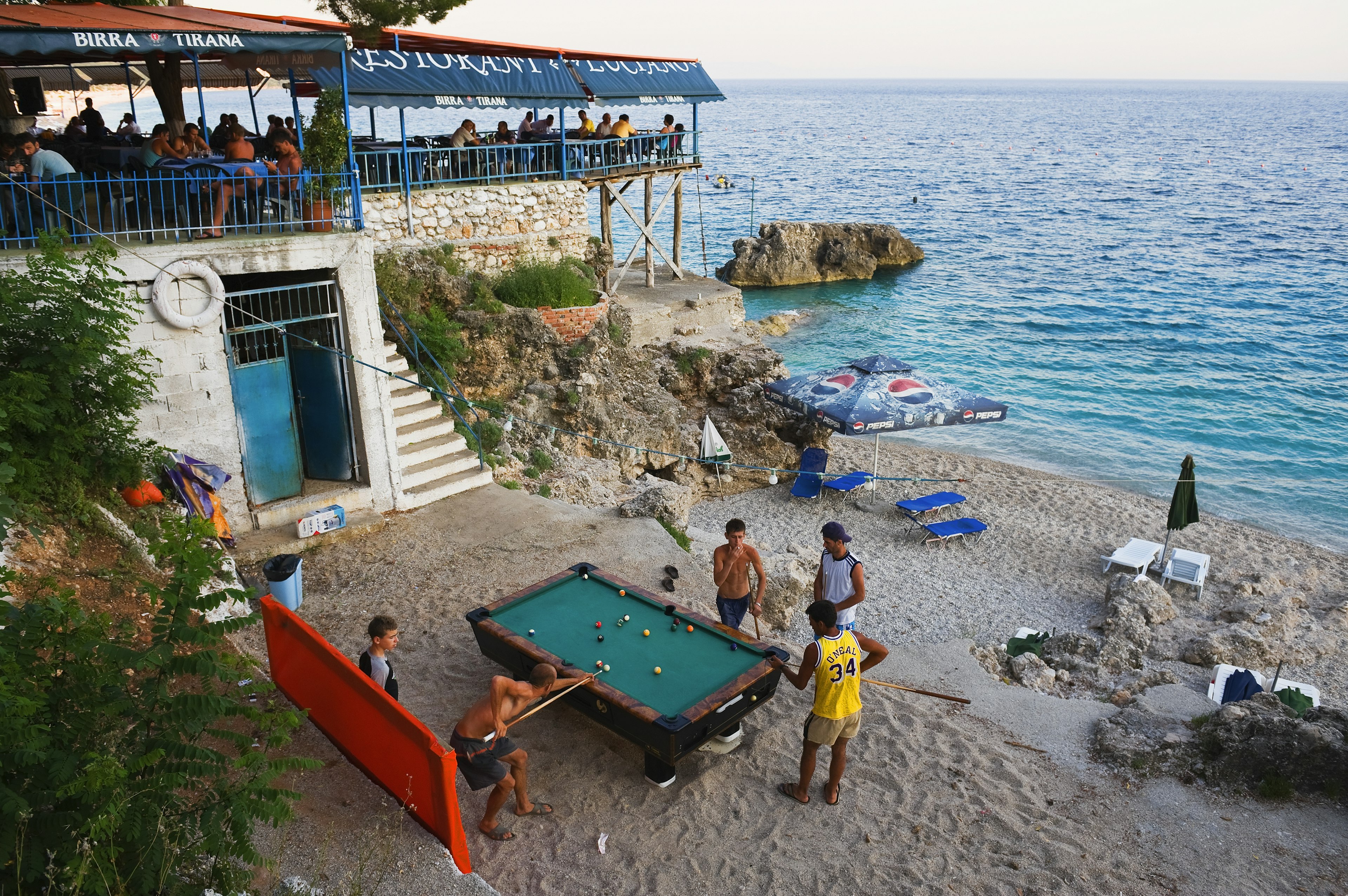 People enjoy time on the beach, play snooker or having good food in the reataurant