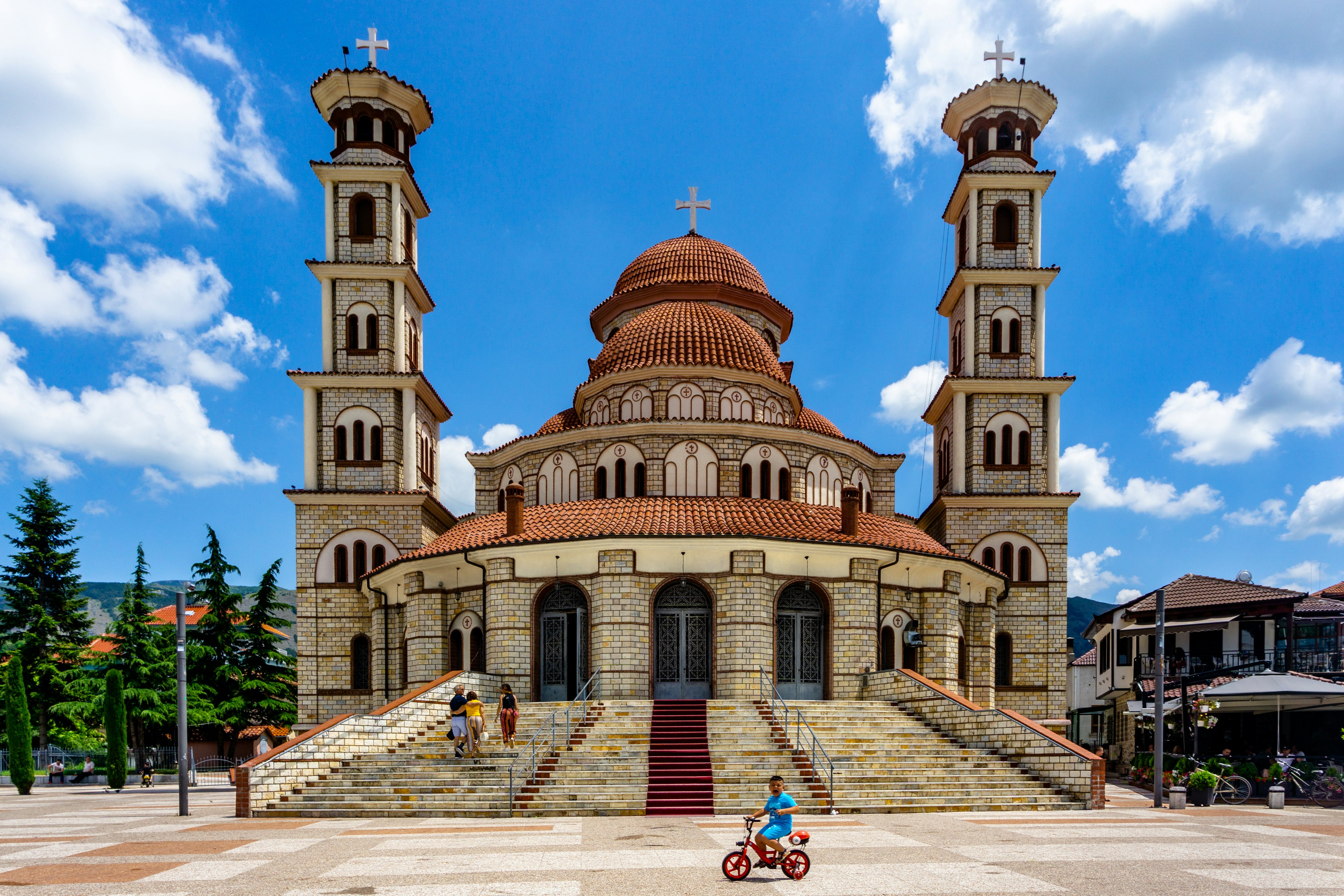 Old houses and orthodox church in the old city of Korce