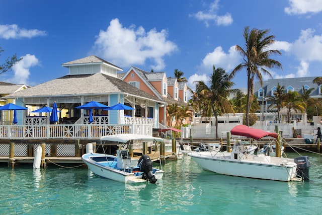 Boats in the turquoise water at Valentine's Marina on Harbour Island, Bahamas