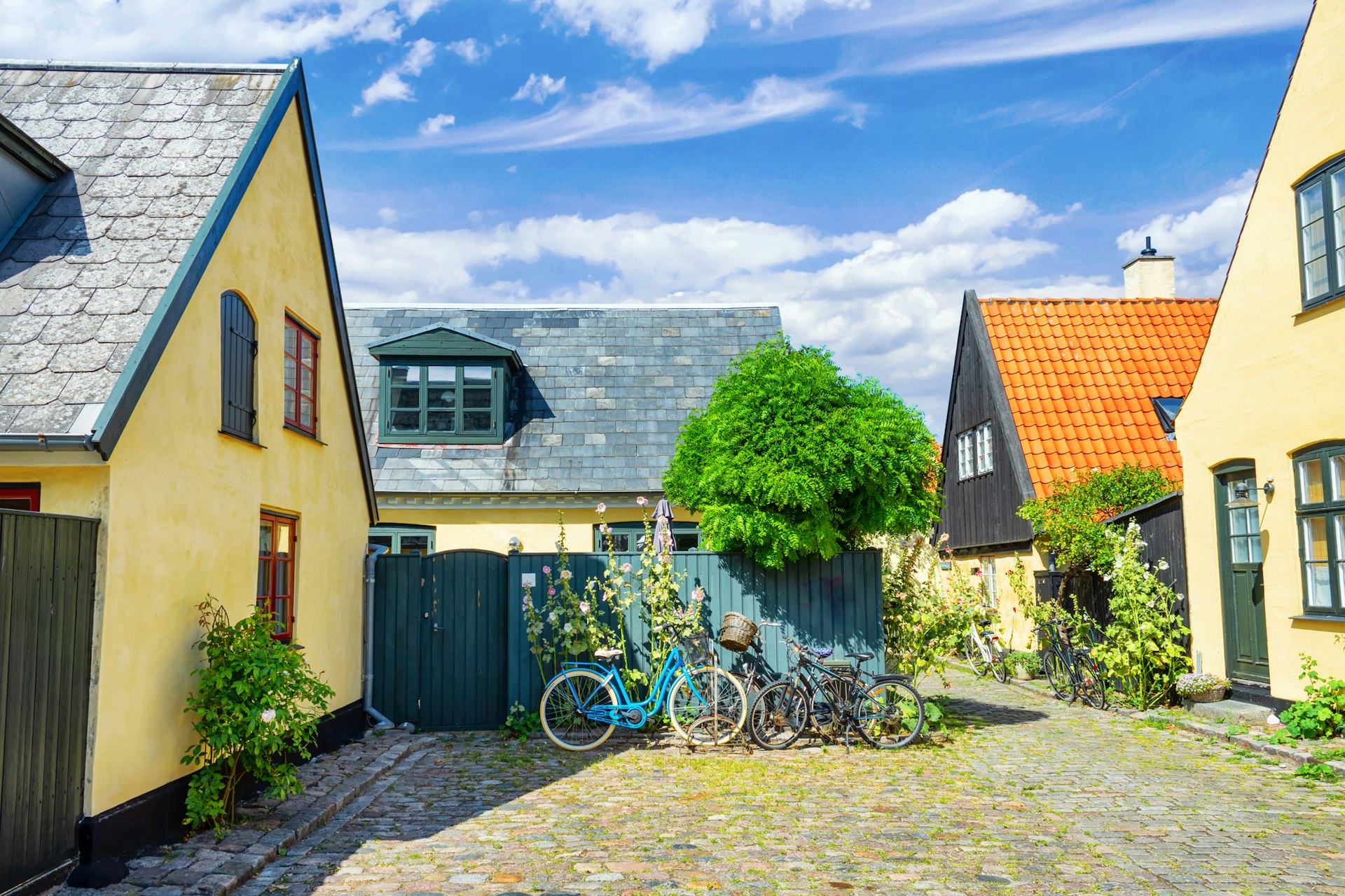Small streets with beautiful, yellow old houses. Traditional Scandinavian houses.Dragor, Denmark. Architecture.