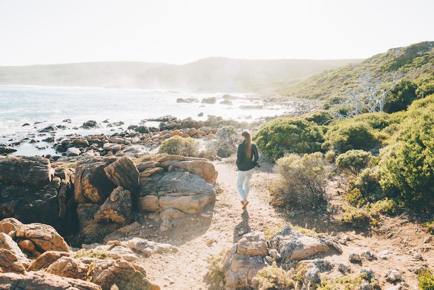 Female hiker on a coastal trail near Cape Naturaliste