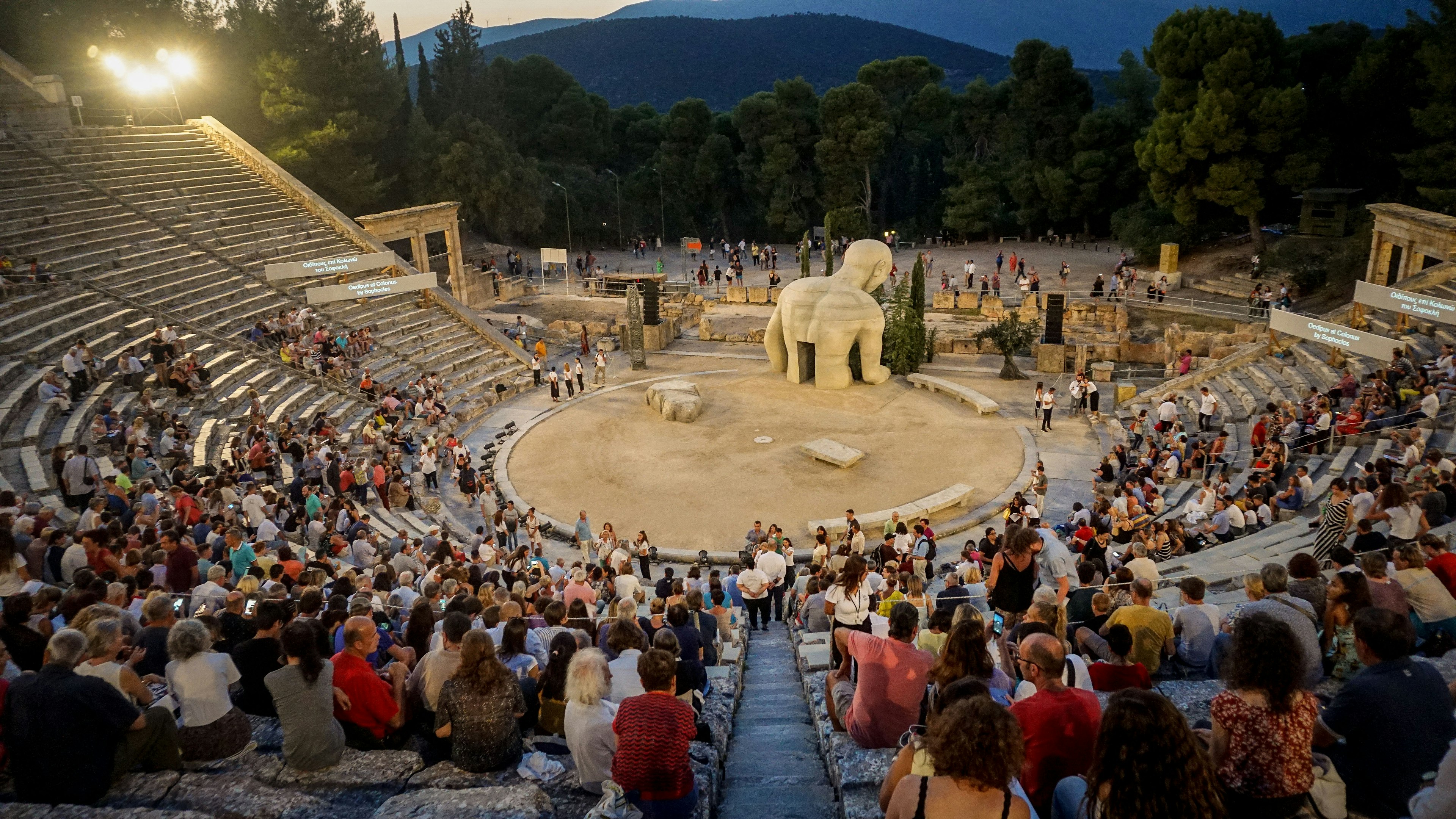 Audience seated in the ancient theater of Epidaurus for the Athens Epidaurus Festival in Greece