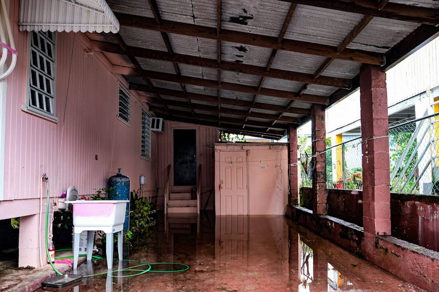 The flooded patio of a house is seen in the Juana Matos neighborhood of Catano, Puerto Rico