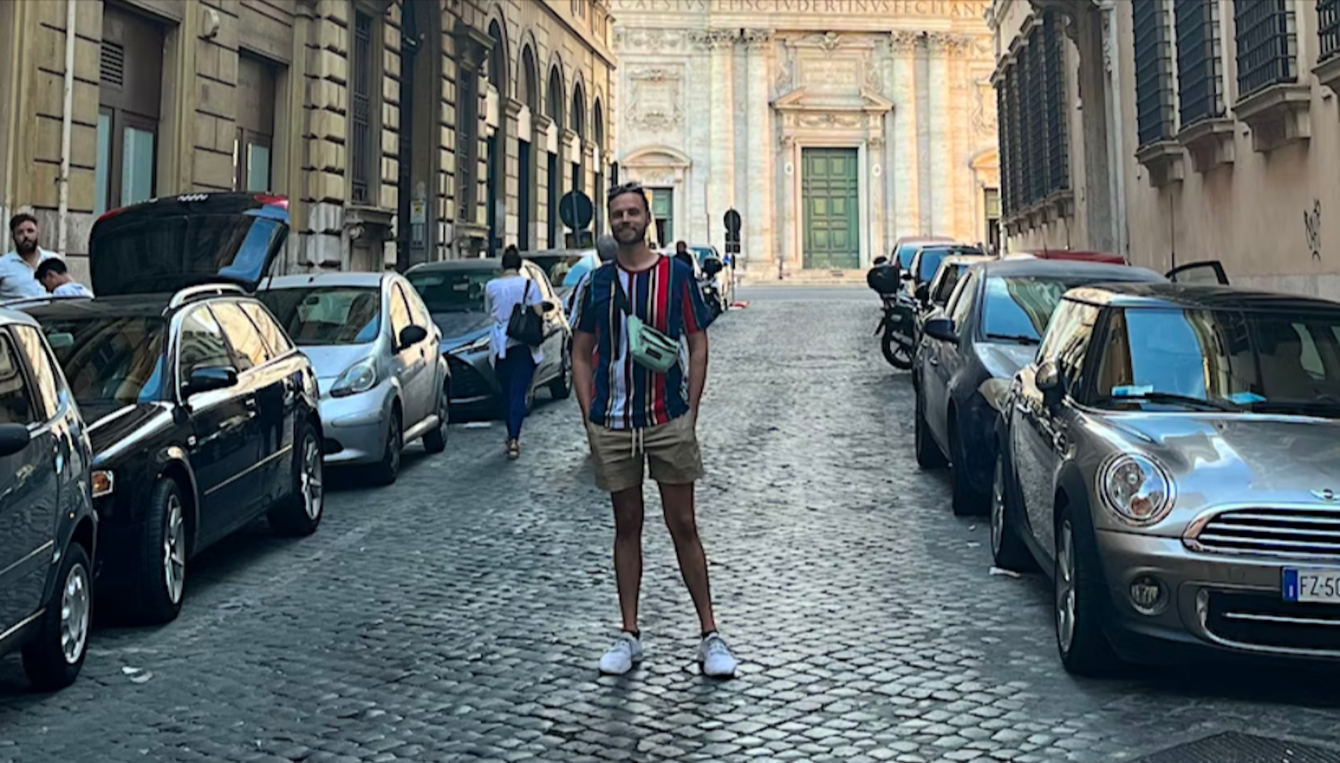 Writer Matt poses on a quiet street in Banchi Vecchi