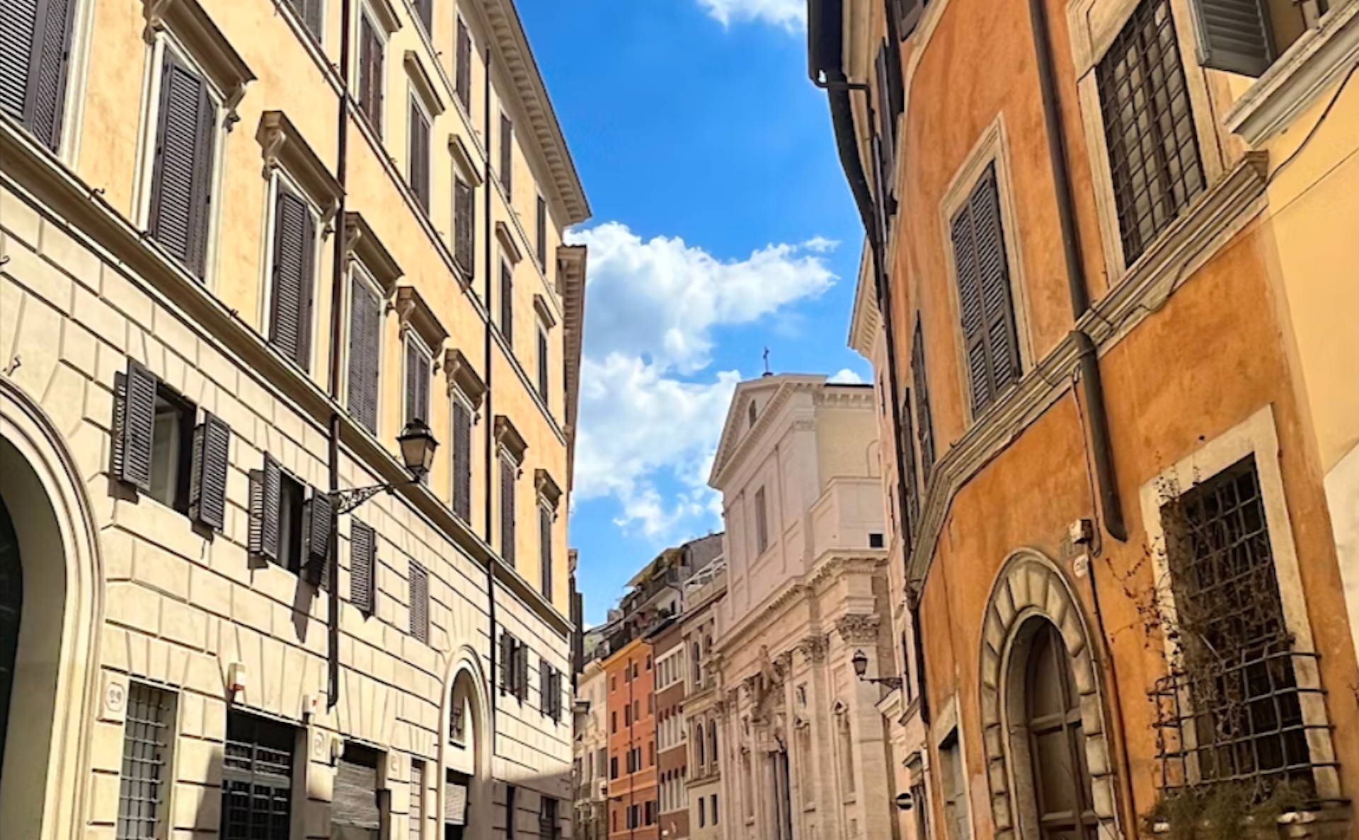 The ochre-colored buildings of Rome's Banchi Vecchi neighborhood