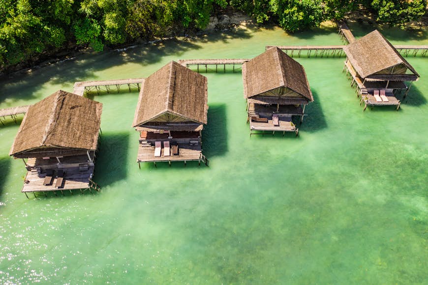 Overwater wooden bungalows in Raja Ampat