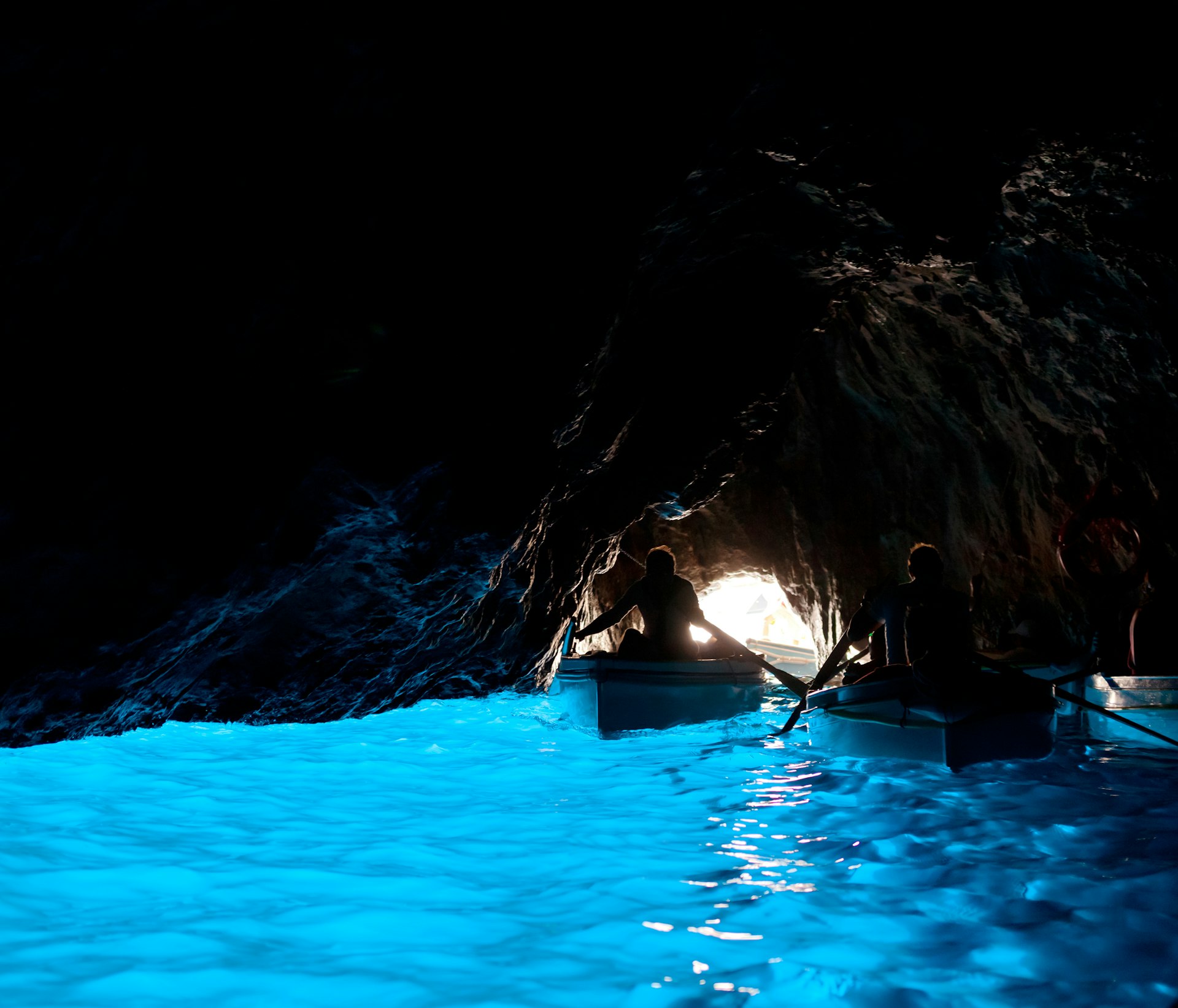 Paddling through Grotta Azzurra, cave on the coast of Capri.