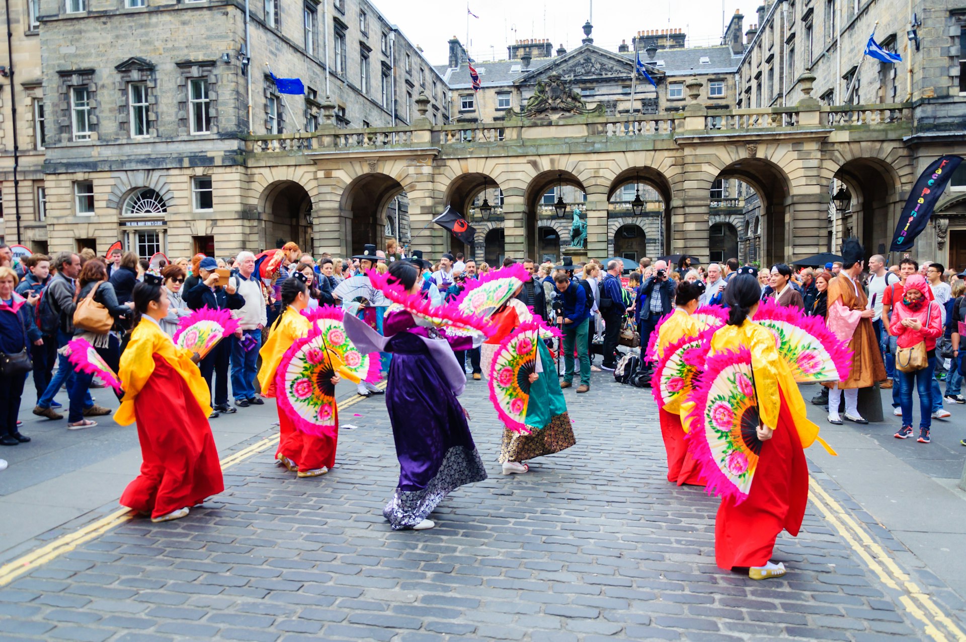 Female performers on the high street during the Edinburgh Fringe Festival in Scotland