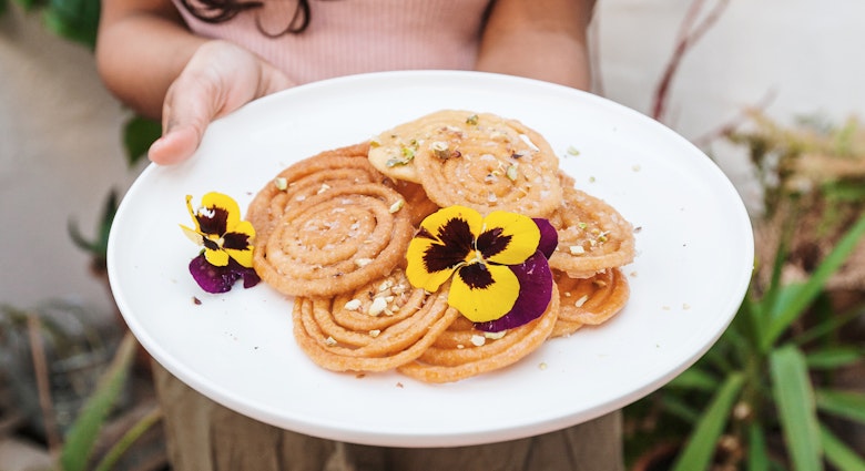 Tour companies cater to vegans by highlighting local cuisine, like this Sri-Lankan dessert, Undu Walalu.
