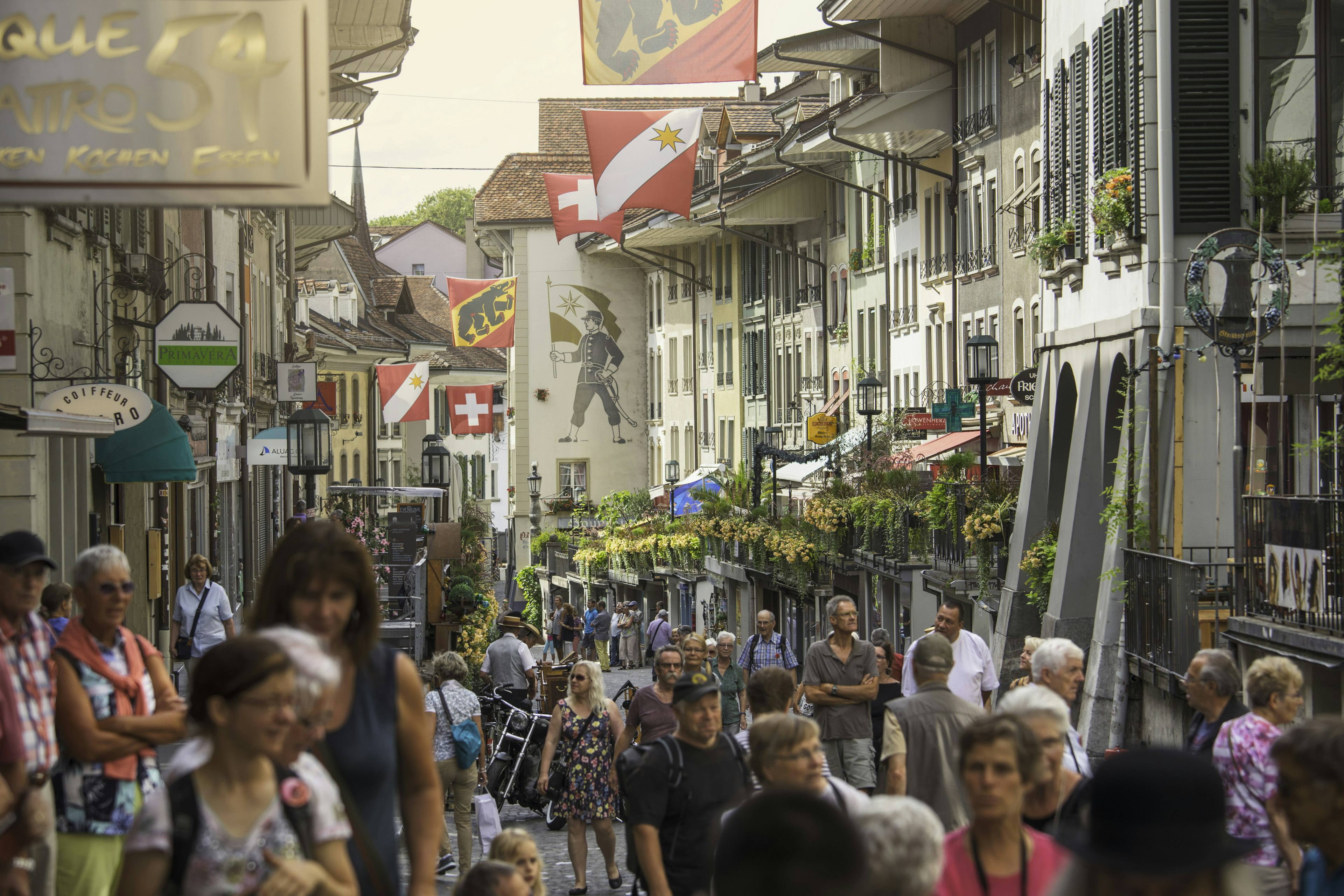 A crowded street on a summer's day in the old town of Thun, a popular tourist destination in the canton of Bern.