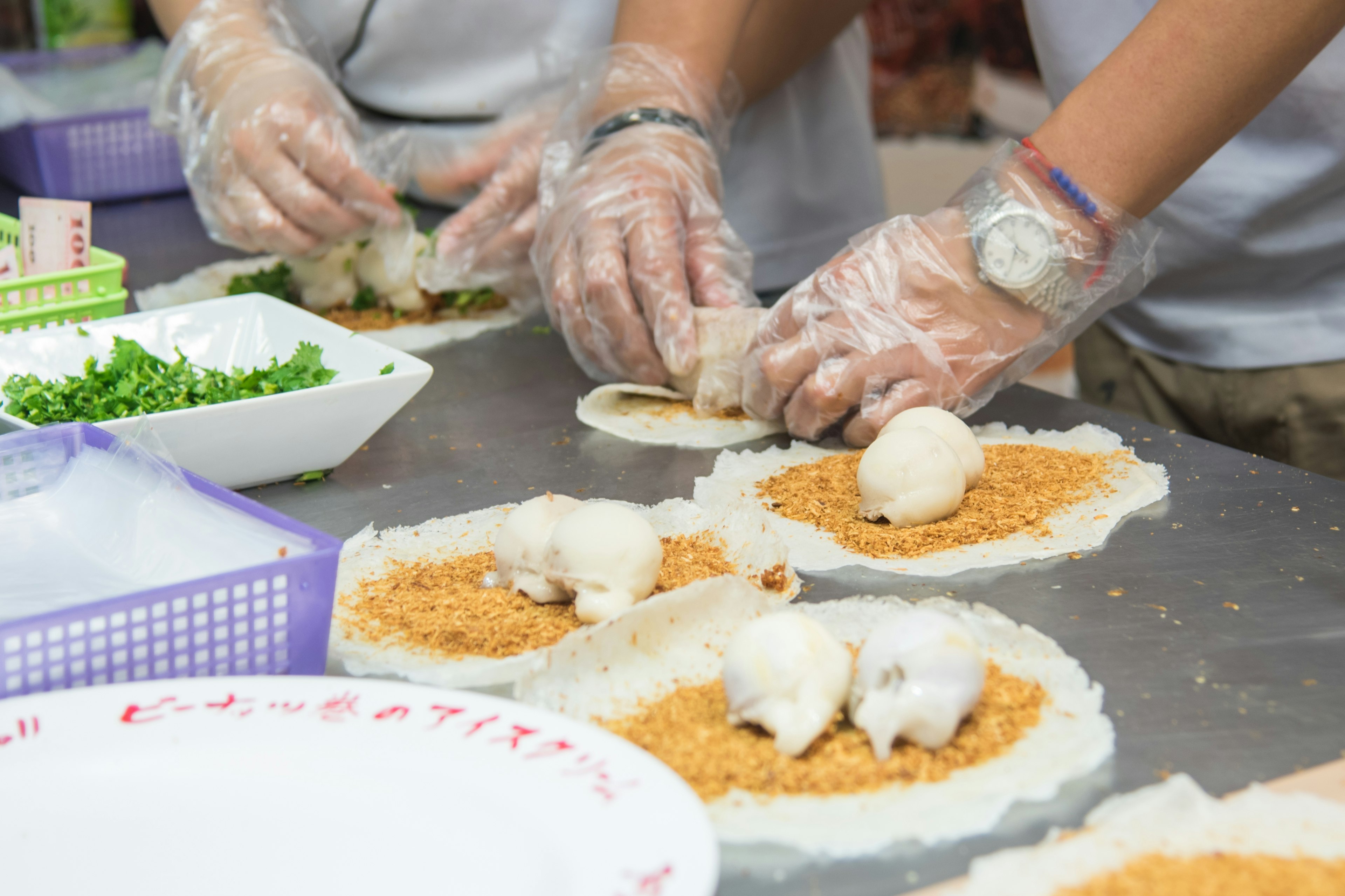 An Ice cream spring roll being made by a chef in Taiwan