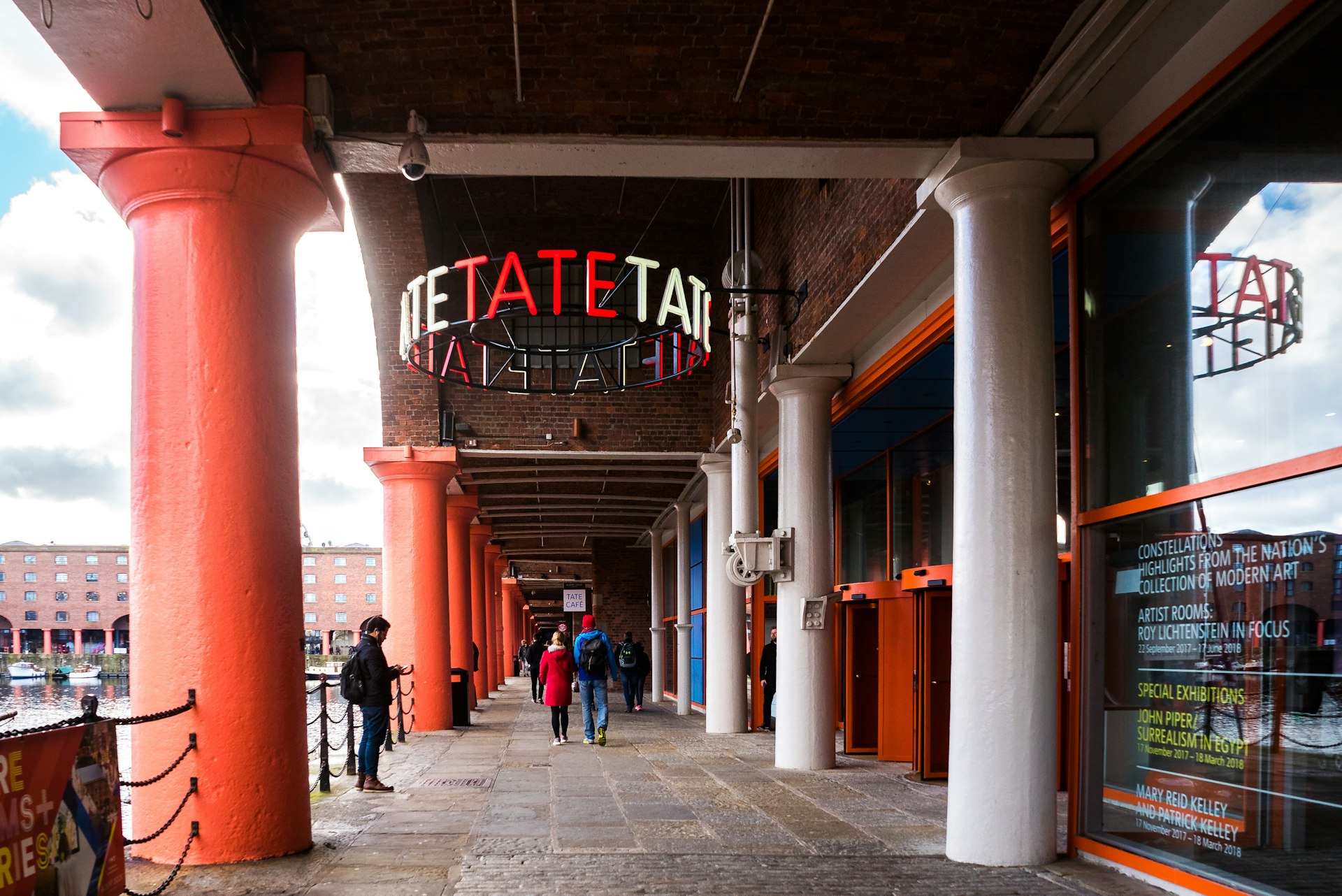 People walking into the Tate Liverpool art gallery in England