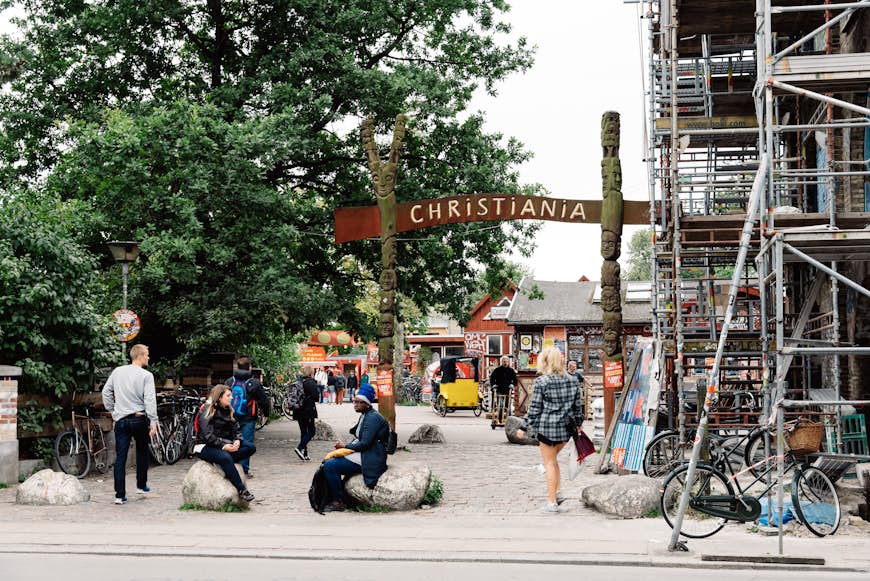 People at the entrance of the autonomous settlement of Christiania
