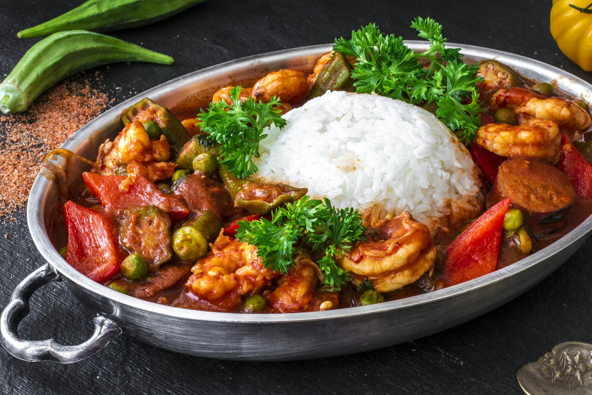 A traditional seafood gumbo with sausages, shrimps, vegetables and Cajun spices