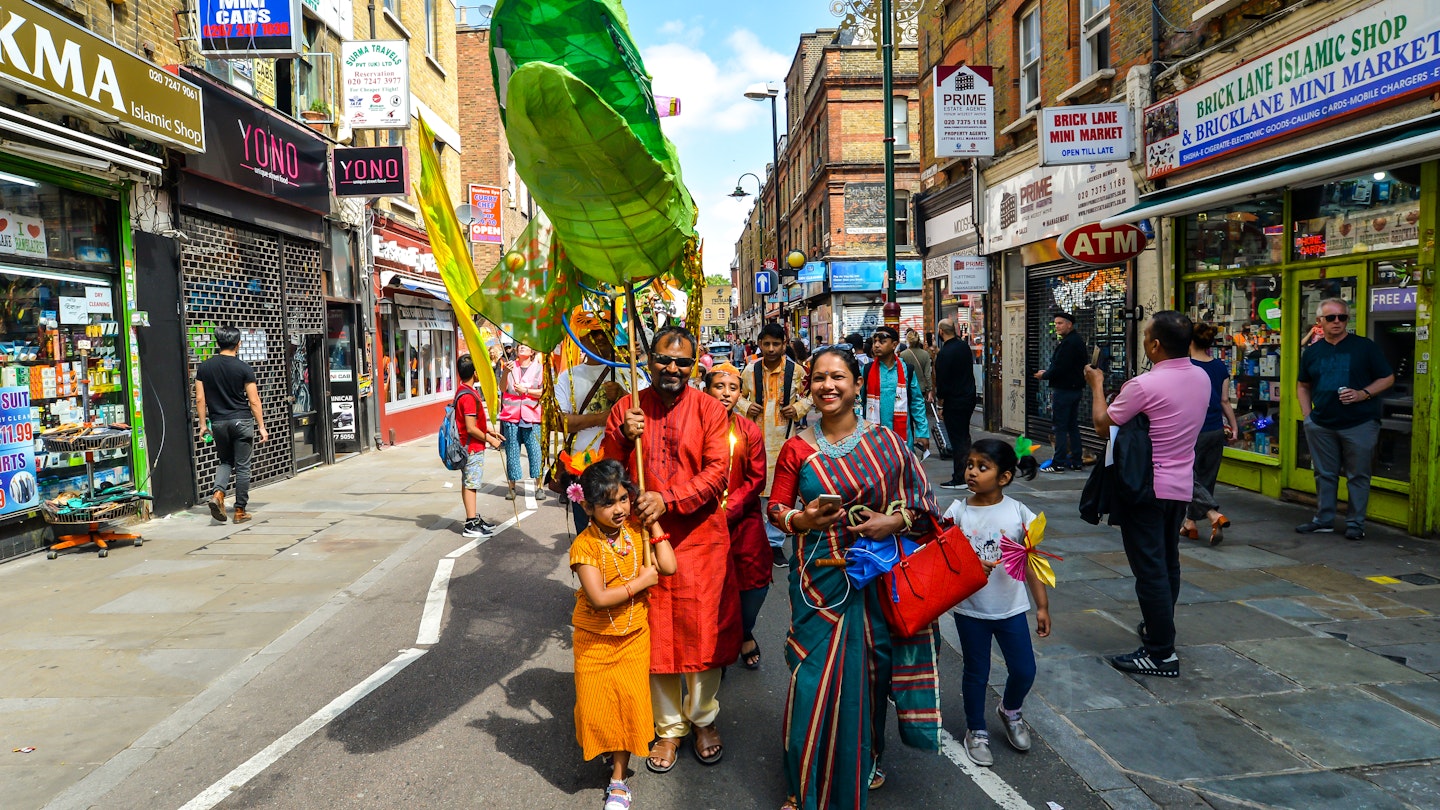 London, UK - 6/30/19 - People taking part in the Boishakhi Mela festival in Bethnal Green in London - The largest Bengali festival outside of Asia celebrating the Bengali New Year; Shutterstock ID 1438262357; your: Zach Laks; gl: 65050; netsuite: Online Editorial; full: Discover