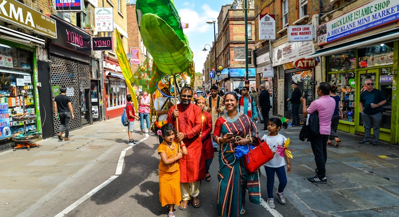 London, UK - 6/30/19 - People taking part in the Boishakhi Mela festival in Bethnal Green in London - The largest Bengali festival outside of Asia celebrating the Bengali New Year; Shutterstock ID 1438262357; your: Zach Laks; gl: 65050; netsuite: Online Editorial; full: Discover