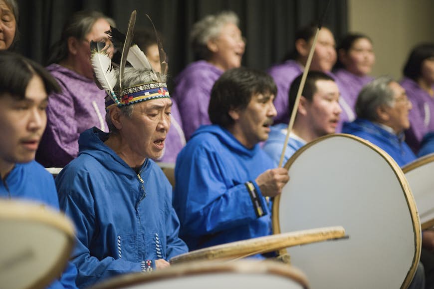 Nagsragmiut Inupiaq Eskimo Drummers of Anaktuvuk Pass performing at a Native Foundation event at the Dena'ina Convention Center, Anchorage, Southcentral, Alaska