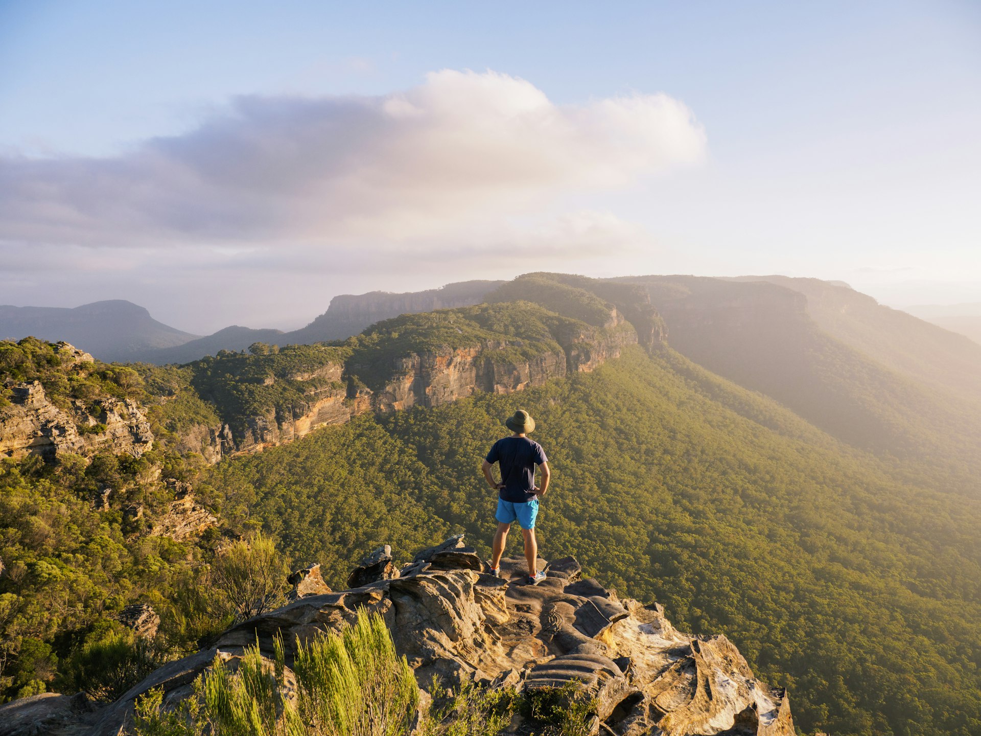 Man standing on peak of Blue Mountains in New South Wales, Australia