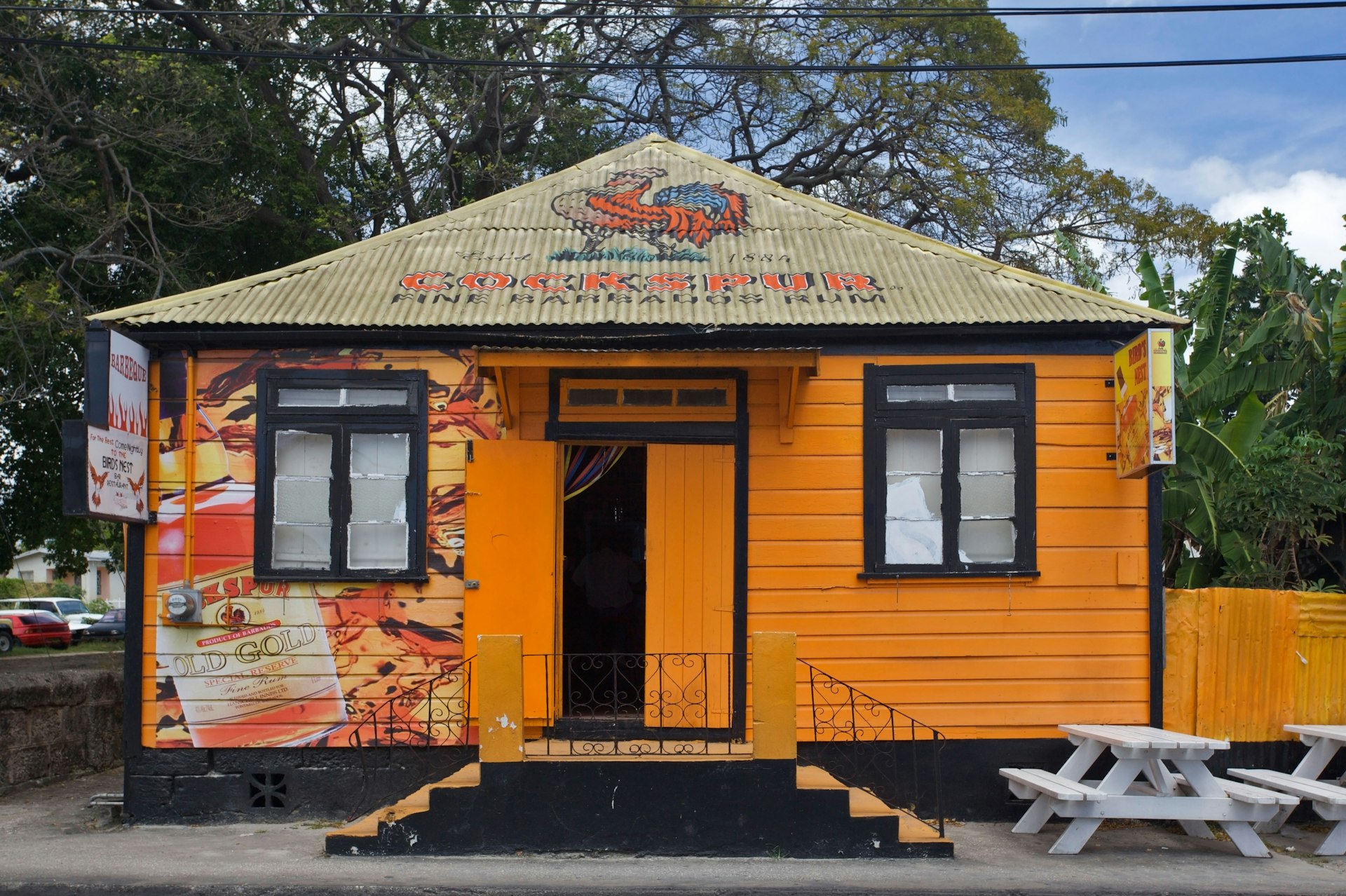 BAR3AY Rum Shop in Bridgetown, St Michael Parish, Barbados – a bright orange small wooden building