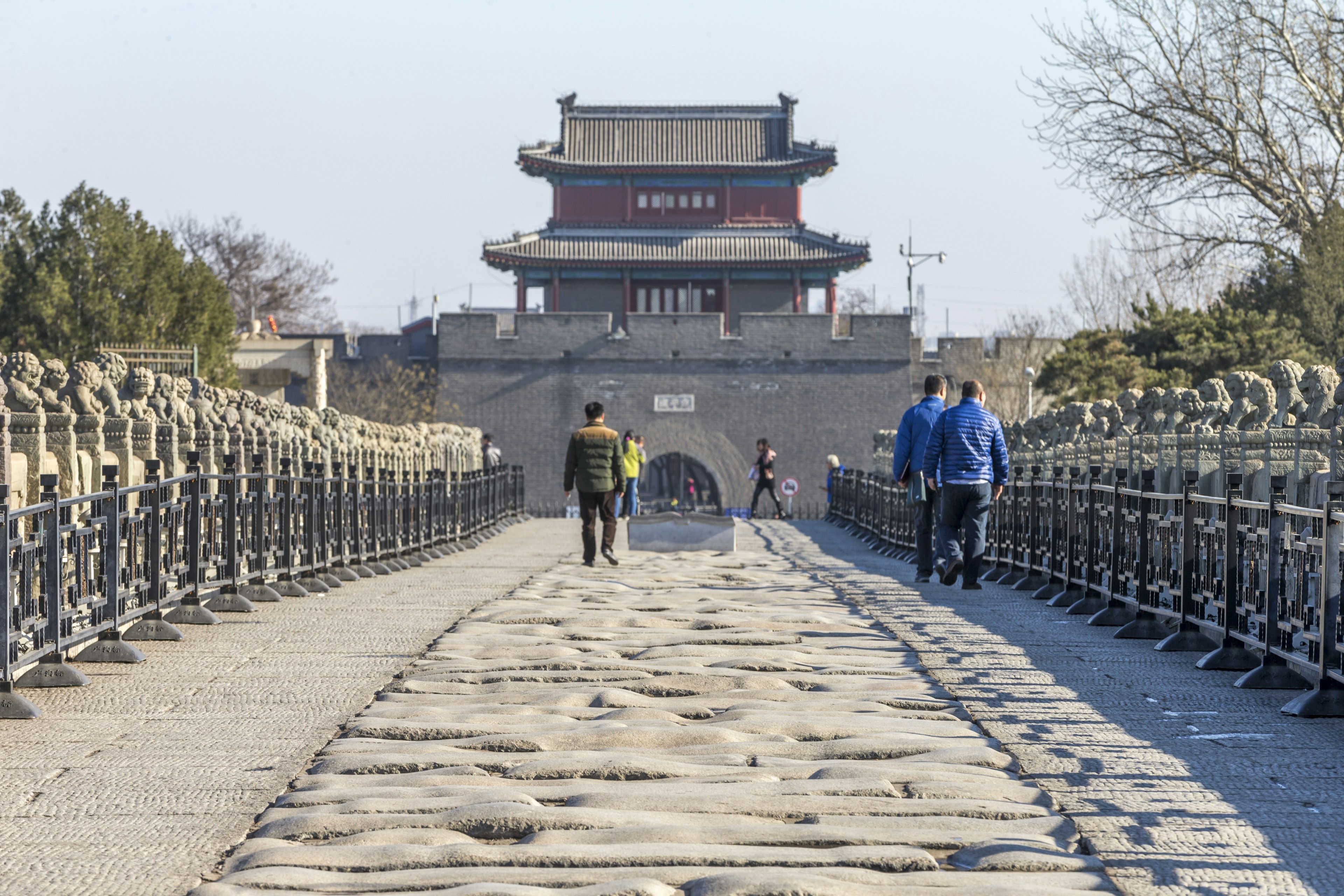 People in front of Wanping Fortress, a Ming dynasty walled city in Beijing