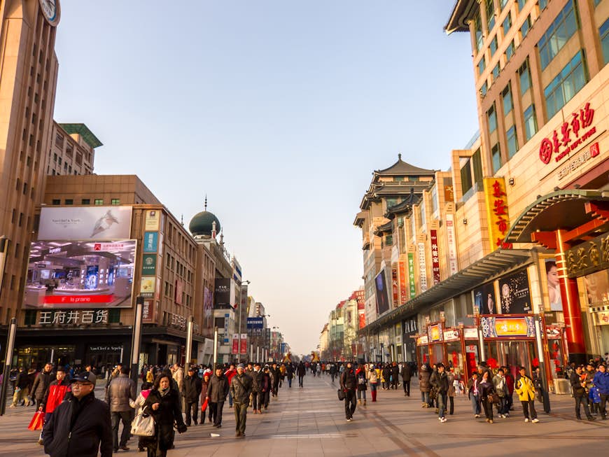 Crowds of people on a shopping street in Beijing