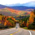Scenic Autumn road in the Adirondacks region of New York - Scenic road in the Adirondacks region of New York during the autumn foliage season