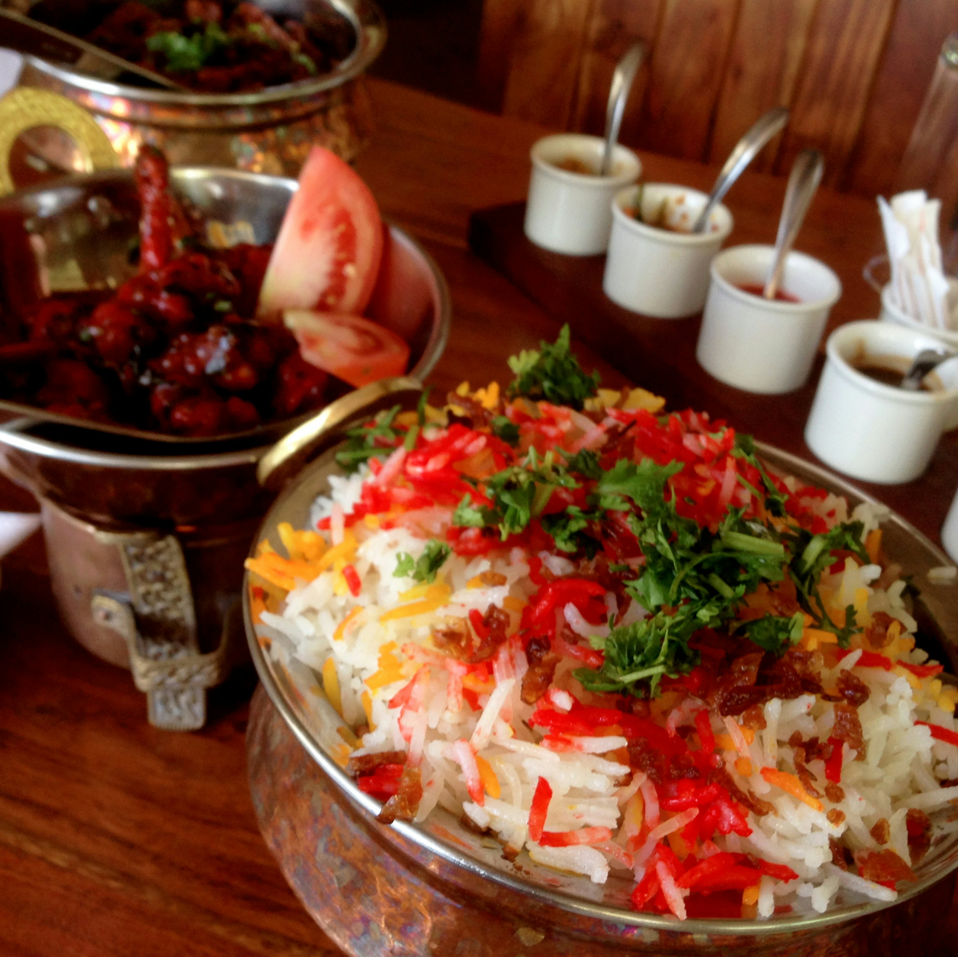 Regional food elements - Kenyan Biryani the hero dish at a special occasion. Accompanied by  Chicken Lollipops, Rogan Josh and condiments.