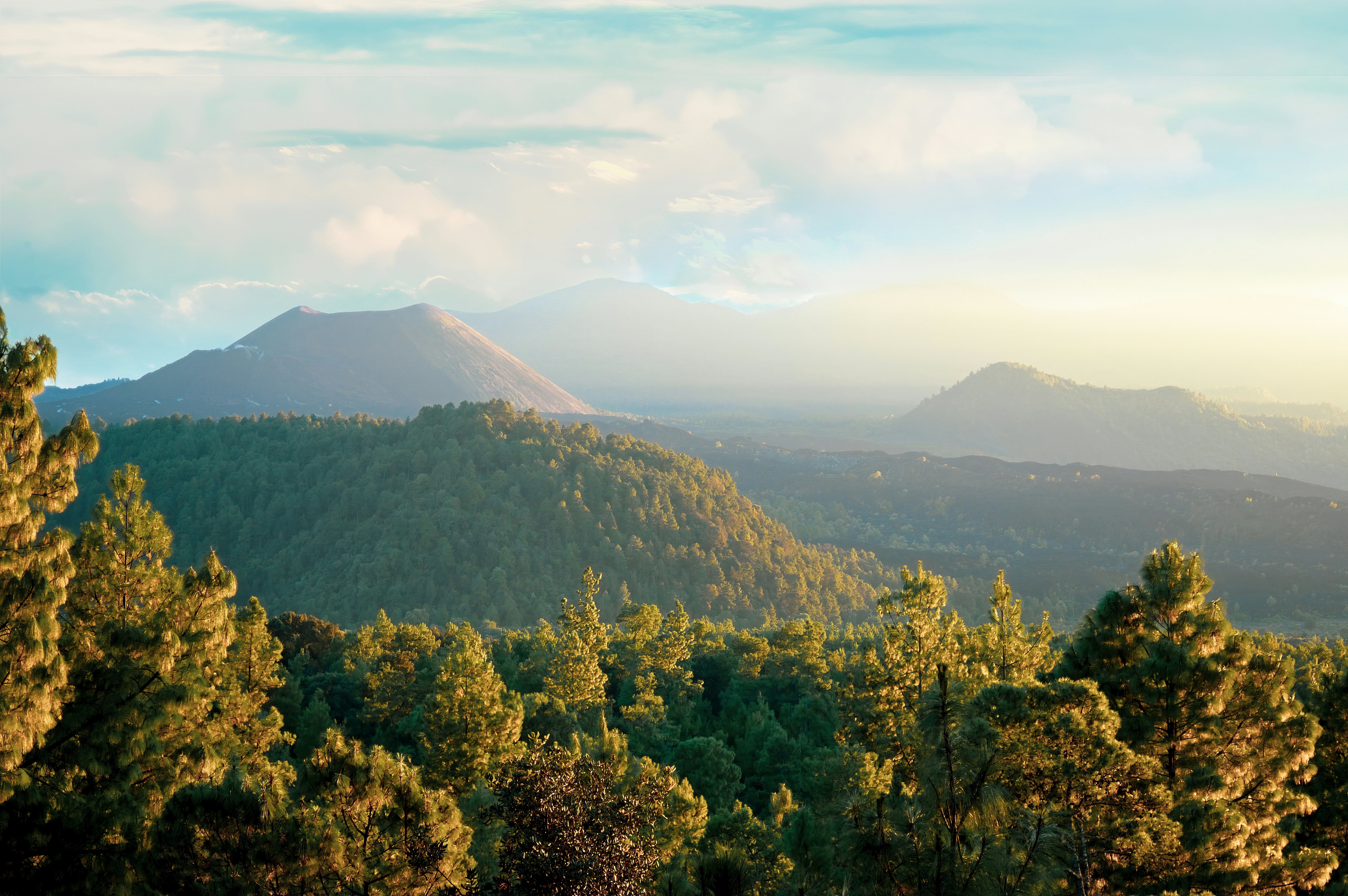 A scenic shot of Mexico's landscape with Volcán Paricutin in the distance