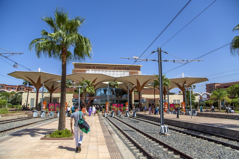 MARRAKESH, MOROCCO - SEPTEMBER 11, 2014: Unidentified people on train station in Marrakesh, Morocco. Station was opened in August 2008 and now is southern end-point of the Moroccan railway system.; Shutterstock ID 223982848; your: Sloane Tucker; gl: 65050; netsuite: Online Editorial; full: Morocco Getting Around Article
