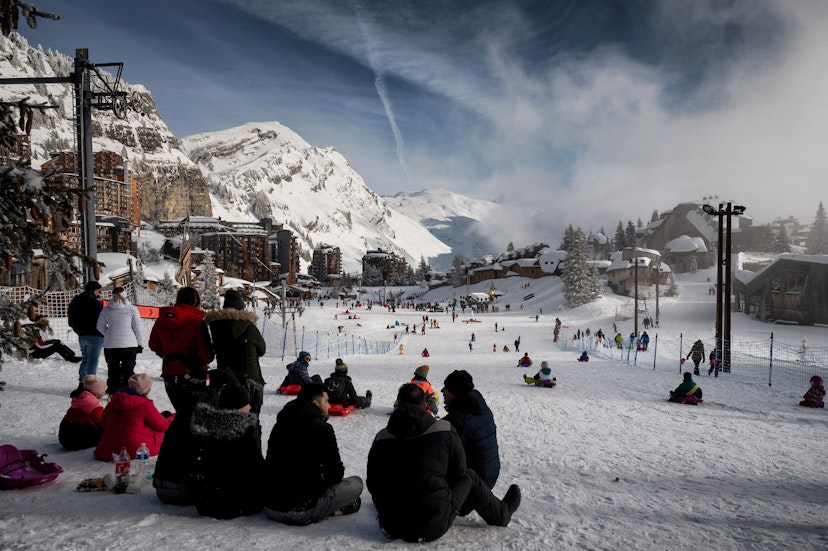 People enjoy the snow at the Avoriaz ski resort, French Alps, on February 11, 2021. (Photo by JEFF PACHOUD / AFP) (Photo by JEFF PACHOUD/AFP via Getty Images)
