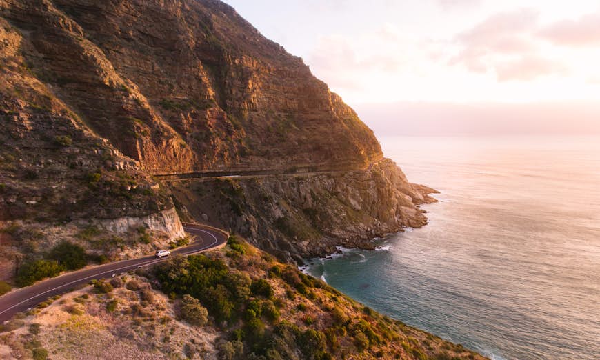 Car driving on the famous Chapmans Peak Drive stretch close to Cape Town, South Africa